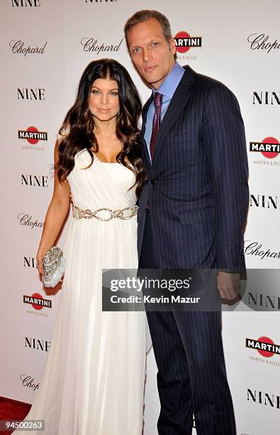 Fergie and President and CEO of Chopard USA Marc Hruschka attends the New York premiere of "NINE" sponsored by Chopard at the Ziegfeld Theatre on...