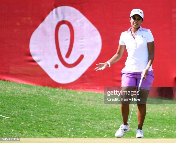 Julieta Granada of Paraguay reacts to her missed putt on the 18th green during the first round of the LPGA LOTTE Championship at the Ko Olina Golf...