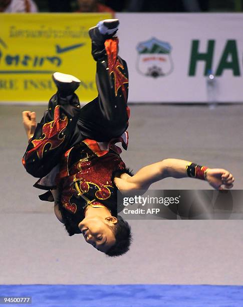 Harris Adli Bin Peranchis of Brunei competes in the men's wushu taolu nangquan final at the 25th Southeast Asian Games in Vientiane on December 15,...