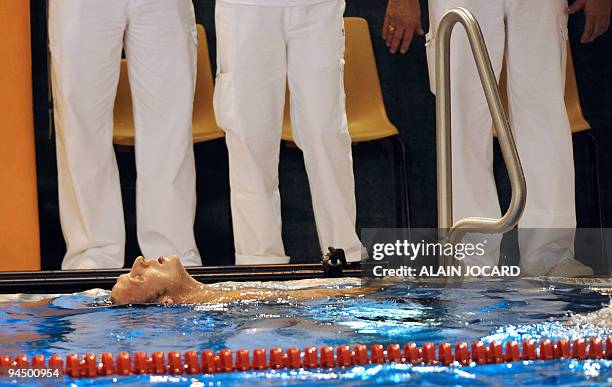 French Amaury Leveaux rests in the pool after winning the men 100 freestyle final during the French small bath swiming national championship on...