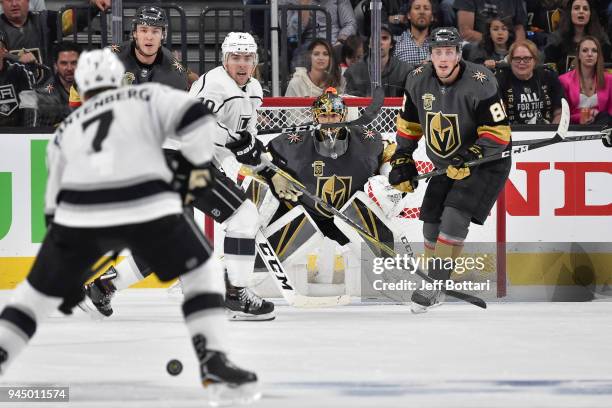 Brayden McNabb, Marc-Andre Fleury and Nate Schmidt of the Vegas Golden Knights defend their goal against Tanner Pearson and Oscar Fantenberg of the...