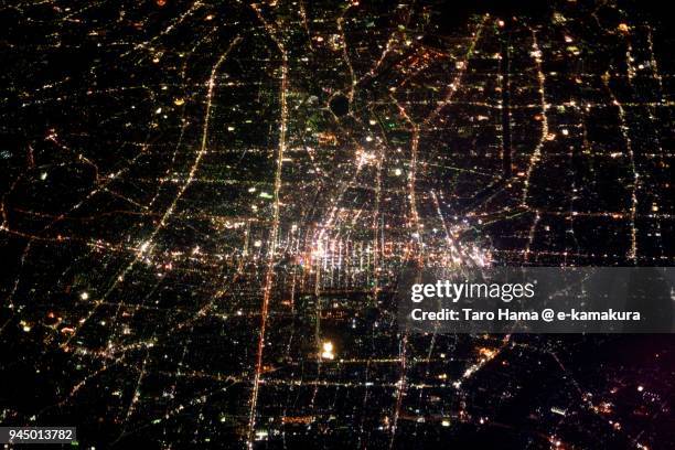 jr nagoya station in aichi prefecture in japan night time aerial view from airplane - aichi prefecture fotografías e imágenes de stock