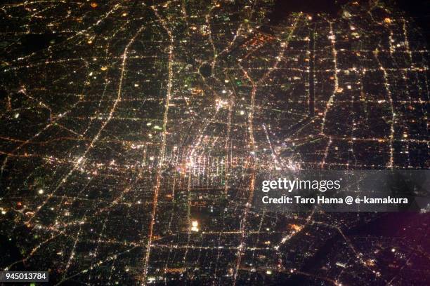 jr nagoya station in aichi prefecture in japan night time aerial view from airplane - nagoya stock pictures, royalty-free photos & images