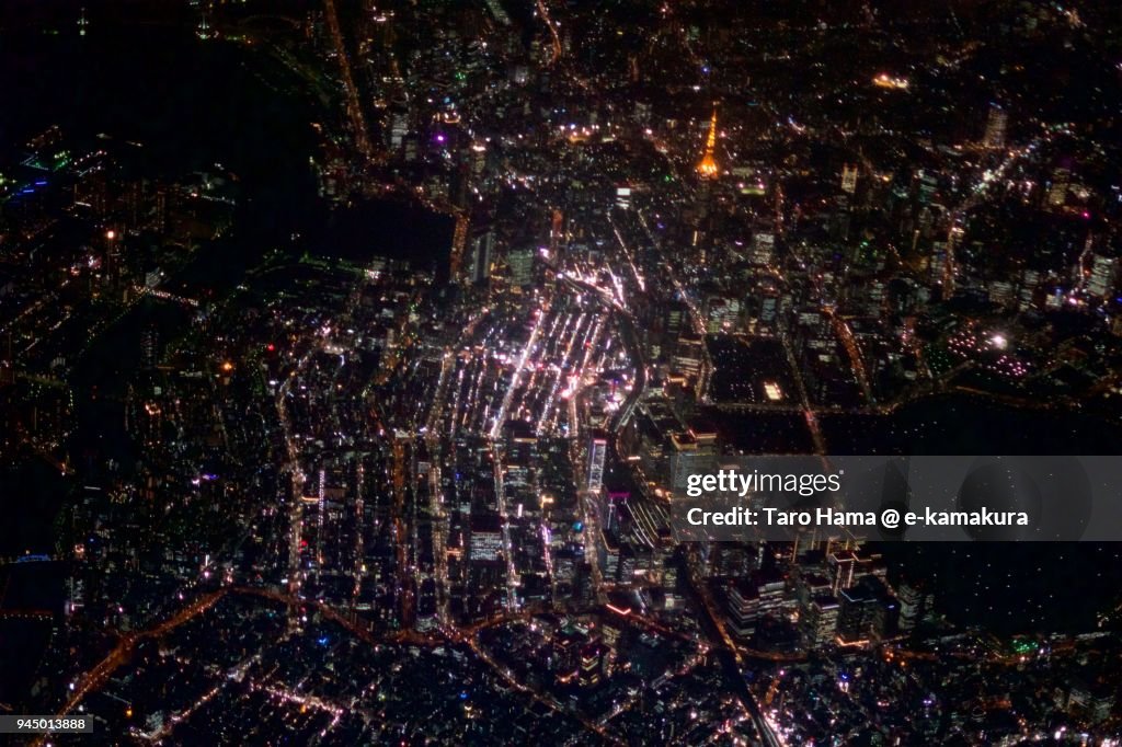 Tokyo Tower, Ginza and Tokyo station in Japan night time aerial view from airplane