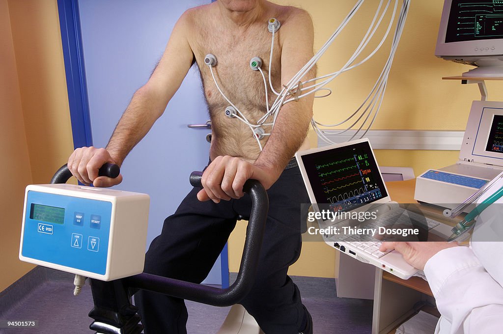 Senior patient receiving cardiology test.
