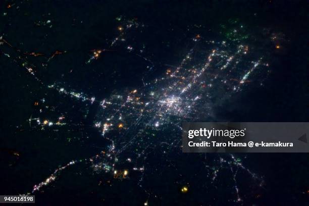 center of himeji city in hyogo prefecture in japan night time aerial view from airplane - prefettura di hyogo foto e immagini stock