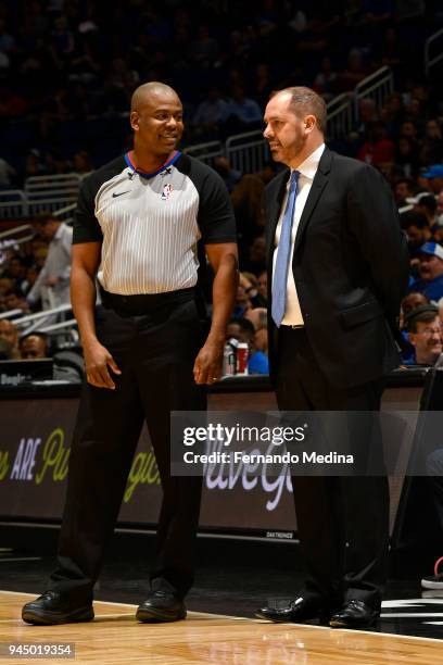 Head Coach Frank Vogel of the Orlando Magic speaks with referee Sean Wright during the Orlando Magic v Washington Wizards game on April 11 2018 at...