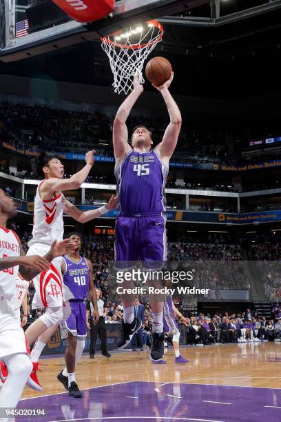 Jack Cooley of the Sacramento Kings goes to the basket against the Houston Rockets on April 11, 2018 at Golden 1 Center in Sacramento, California....