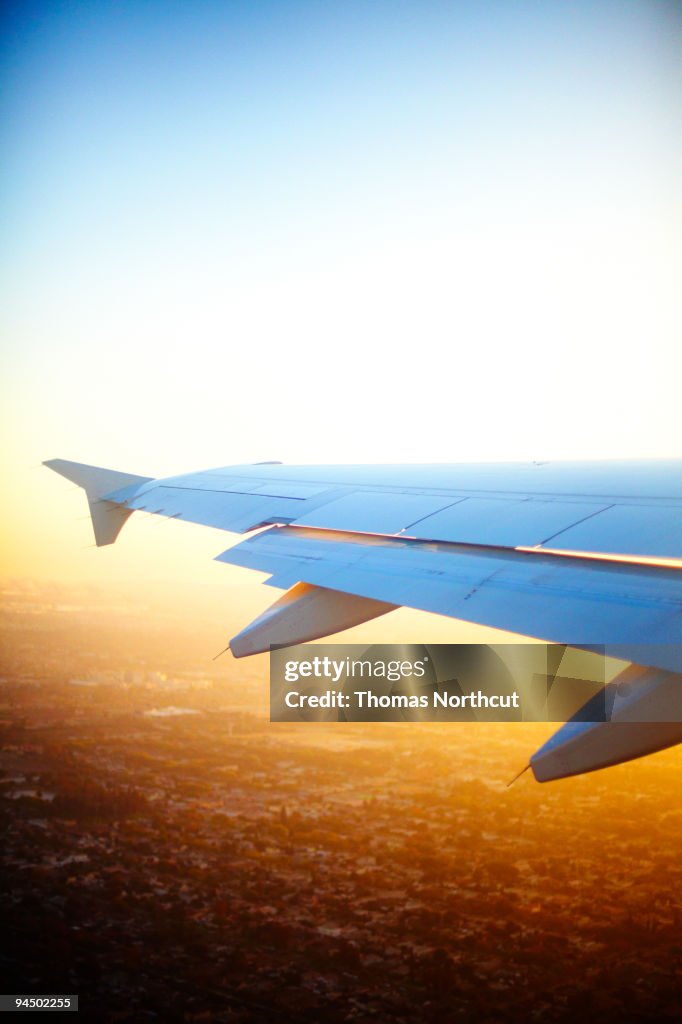 View of airplane wing, Long Beach CA below