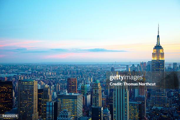 empire state building and nyc skyline at dusk - nyc skyline stock pictures, royalty-free photos & images