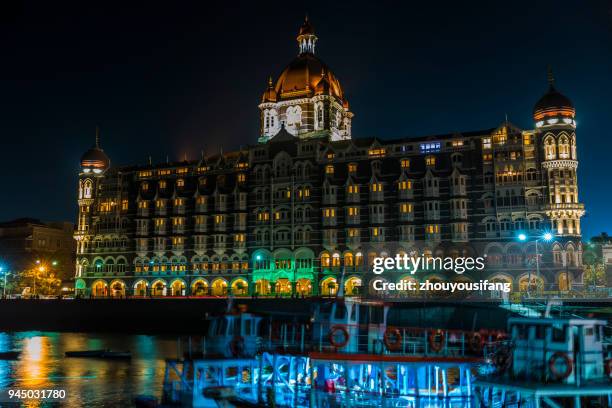 the taj mahal hotel in mumbai - taj mahal night stock pictures, royalty-free photos & images