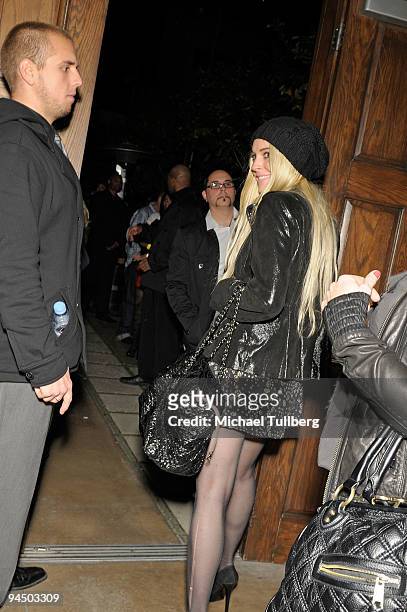 Actress Lindsay Lohan arrives at the launch party for MH+L magazine, held at the Boulevard3 nightclub on December 15, 2009 in Los Angeles, California.