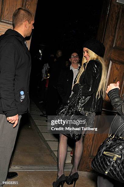 Actress Lindsay Lohan arrives at the launch party for MH+L magazine, held at the Boulevard3 nightclub on December 15, 2009 in Los Angeles, California.