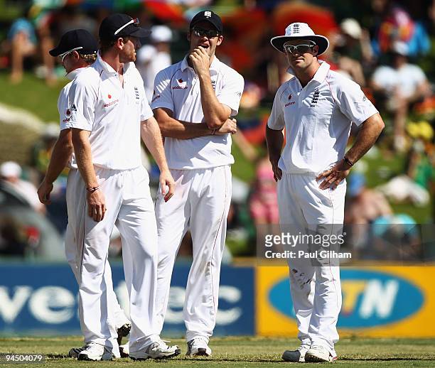 Paul Collingwood, James Anderson, and Andrew Strauss of England look dejected after loosing their second referral during day one of the first test...
