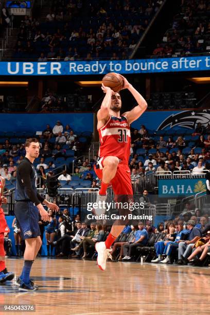 Tomas Satoransky of the Washington Wizards shoots the ball against the Orlando Magic on April 11 2018 at Amway Center in Orlando, Florida. NOTE TO...