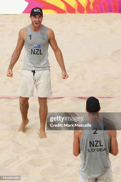 Ben O'Dea and Sam O'Dea of New Zealand celebrate winning the Beach Volleyball Men's Bronze Medal match between Chris Gregory and Jake Sheaf of...