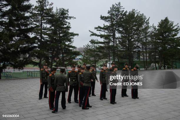 In a photo taken on April 10, 2018 students stand in a courtyard at the Mangyongdae Revolutionary Academy outside Pyongyang. The elite Academy was...