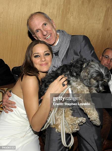 Actress Marion Cotillard and producer John DeLuca attend the after party of the New York premiere of "NINE" at the M2 Ultra Lounge on December 15,...