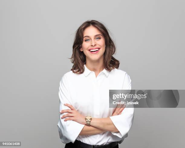 portrait of beautiful young businesswoman - dressing up stock pictures, royalty-free photos & images