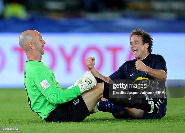 Goalkeeper Paul Gothard of Auckland City celebrates with teammate Chad Coombes during the FIFA Club World Cup 5th place match between TP Mazembe and...