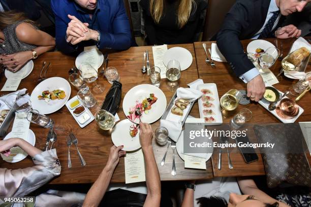 Guests attend the Haute Residence 2018 Luxury Real Estate Summit NYC Kickoff Dinner At Scarpetta at Scarpetta on April 11, 2018 in New York City.