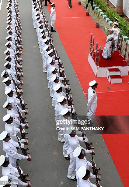 Gujarat state Governor Dr. Kamla Beniwal launches Indian Coast Guard First Day Cover in Gandhinagar, some 30 km from Ahmedabad, on December 16, 2009....
