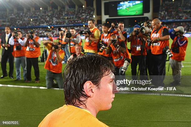 Lionel Messi of FC Barcelona sits on the bench during the FIFA Club World Cup semi-final match between Atlante and Barcelona at the t the Zayed...
