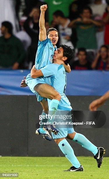 Guillermo Rojas of Atlante celebrates the first goal with Rafael Marquez of Atlante during the FIFA Club World Cup semi-final match between Atlante...