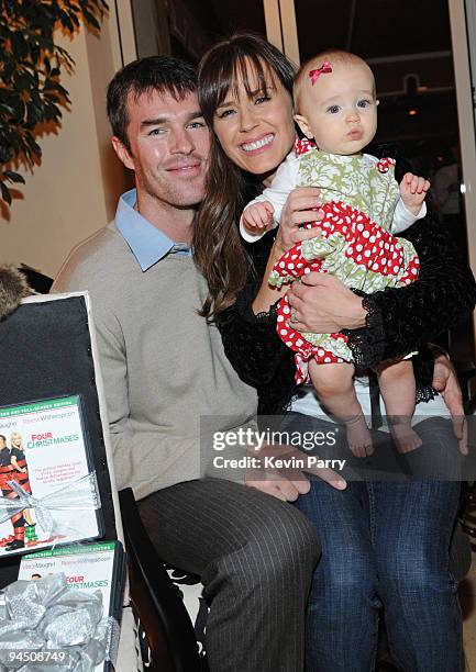 Television personalities Trista Sutter , her husband Ryan Sutter and daughter Blakesley Grace Sutter arrive to JCPenney's 'Joy of Giving' party held...