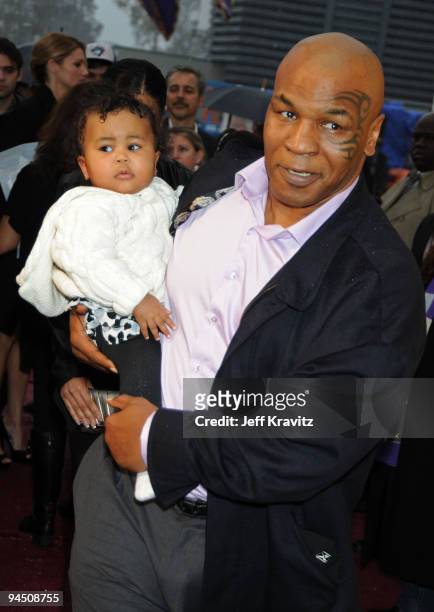 Boxer Mike Tyson and his daughter Milan arrive at Spike TV's 7th Annual Video Game Awards at the Nokia Event Deck at LA Live on December 12, 2009 in...