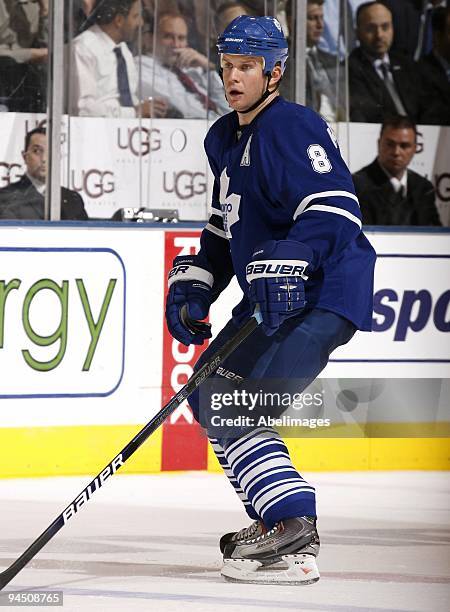 Mike Komisarek of the Toronto Maple Leafs skates up the ice against the Ottawa Senators on December 14, 2009 at the Air Canada Centre in Toronto,...