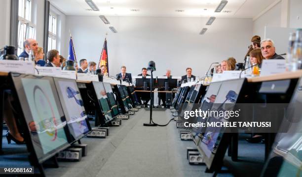 German Interior Minister Horst Seehofer sits next to the president of the German Federal Criminal Police Office Holger Muench , the head of the...