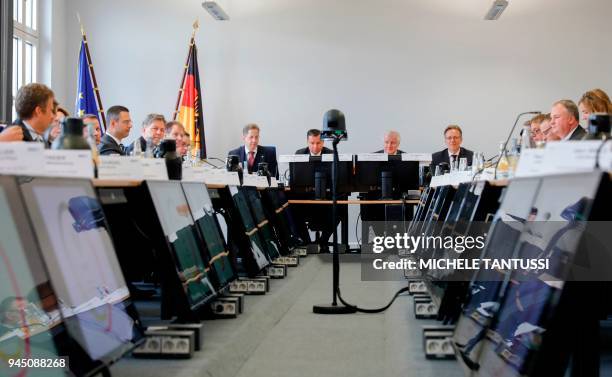 German Interior Minister Horst Seehofer sits next to the president of the German Federal Criminal Police Office Holger Muench , the head of the...