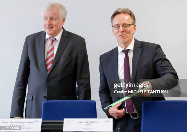 German Interior Minister Horst Seehofer and the president of the German Federal Criminal Police Office Holger Muench take their seats ahead of a...