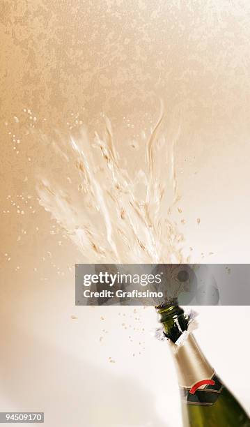 bottle champagne exploding - spraying champagne stock pictures, royalty-free photos & images
