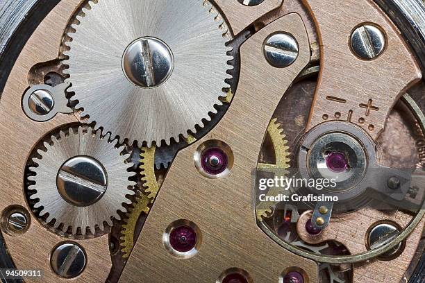 gear wheels in clock - clockwork stock pictures, royalty-free photos & images