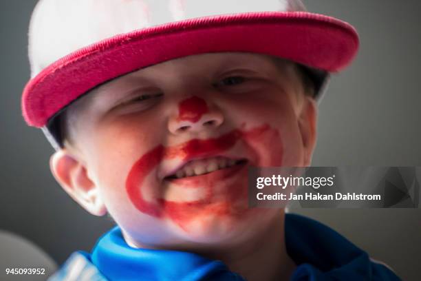 little boy with a painted clown face - clown face paint stock pictures, royalty-free photos & images