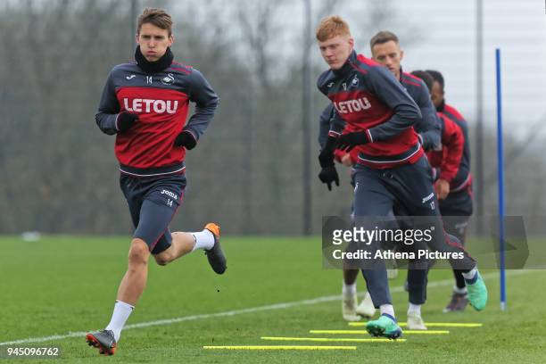 Tom Carroll in action during the Swansea City Training at The Fairwood Training Ground on April 11, 2018 in Swansea, Wales.