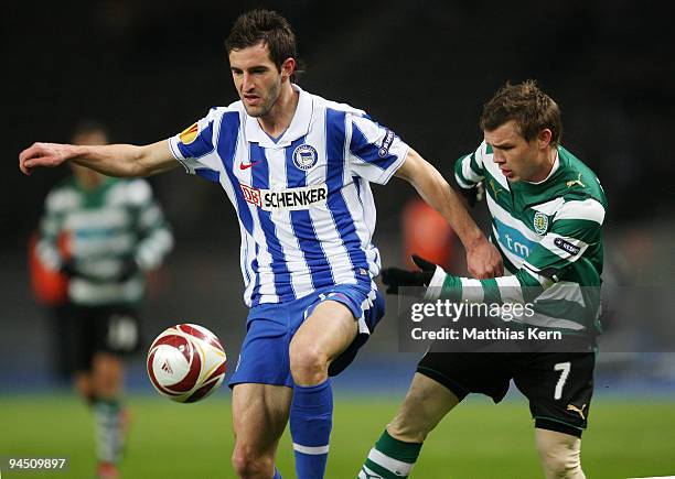 Maximilian Nicu of Berlin battles for the ball with Marat Izmailov of Lissabon during the UEFA Europa League match between Hertha BSC Berlin and...