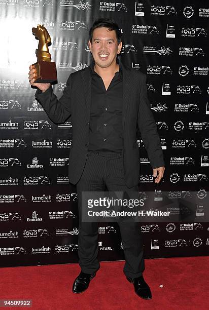 Brillante Mendoza with the Muhr AsiaAfrica Feature Best Film award for Lola during the Closing Night Award Ceremony at the 6th Annual Dubai...