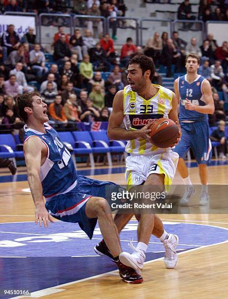 Marin Rozic, #20 of Cibona competes with Serhat Cetin, #33 of Fenerbahce Ulker Istanbul competes in action during the Euroleague Basketball Regular...