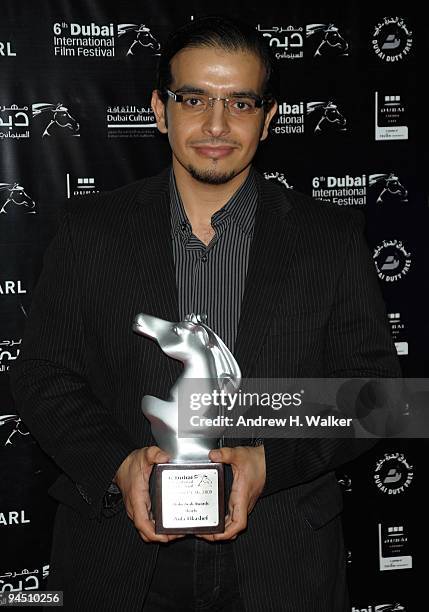 Director Mohammad Aldhahri with the Muhr Arab Short Film award for Sunset/Sunrise and the Fiprisci Prize during the Closing Night Award Ceremony at...