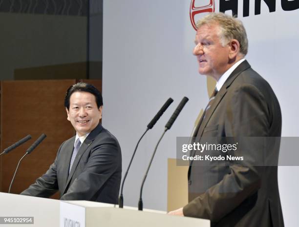 Hino Motors Ltd. President Yoshio Shimo and Volkswagen Truck &amp; Bus GmbH CEO Andreas Renschler hold a press conference in Tokyo on April 12 after...