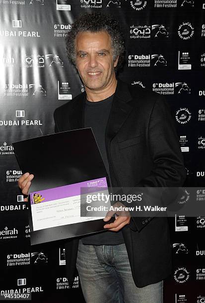 Hakim Belabbes with the Muhr Arab Documentary Special Mention award for "In Pieces" during the Closing Night Award Ceremony at the 6th Annual Dubai...