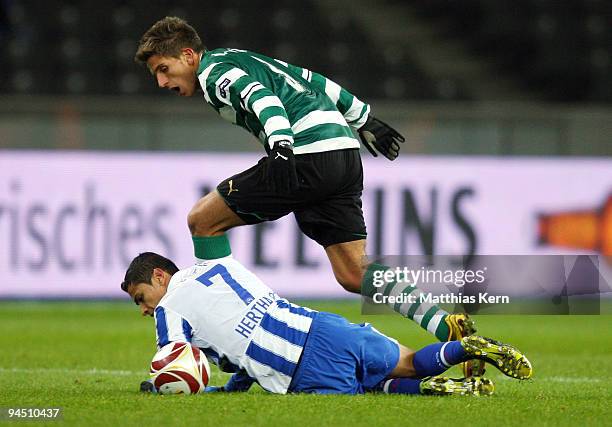 Cicero of Berlin battles for the ball with Daniel Carrico of Lissabon during the UEFA Europa League match between Hertha BSC Berlin and Sporting...