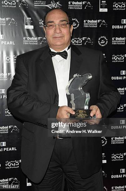 Director Magdy Ahmed Aly with the Muhr Arab Feature award for Best Editor on behalf of Ahmed Dawood during the Closing Night Award Ceremony at the...