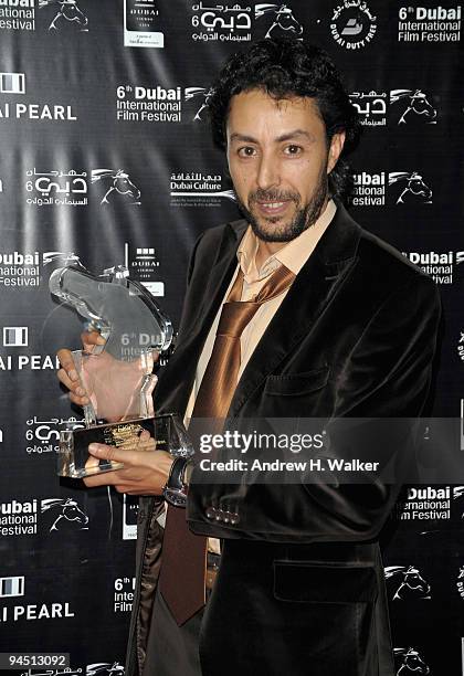 Said Bey with the Muhr Arab Feature award for Best Actor for "The Man Who Sold The World" during the Closing Night Award Ceremony at the 6th Annual...