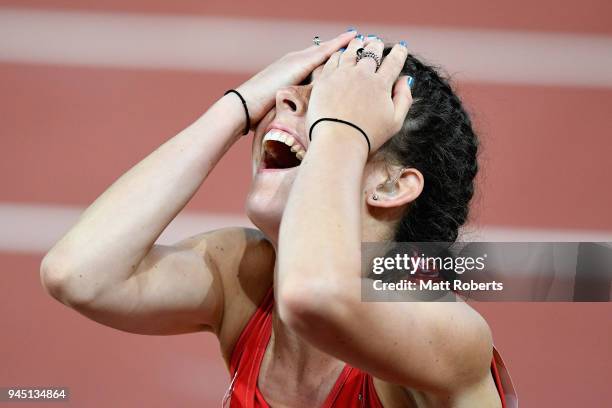 Olivia Breen of Wales celebrates as she wins bronze in the Women's T38 100m Final during athletics on day eight of the Gold Coast 2018 Commonwealth...