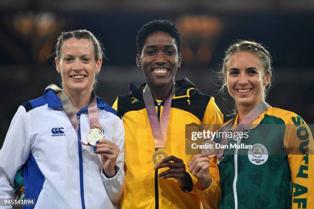 Silver medalist Eilidh Doyle of Scotland, gold medalist Janieve Russell of Jamaica and bronze medalist Wenda Nel of South Africa pose during the...