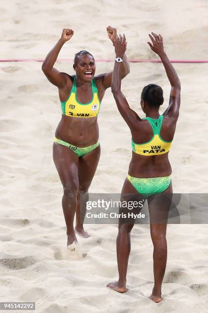 Linline Matauatu and Miller Pata of Vanuatu celebrates winning the Beach Volleyball Women's Bronze Medal match between Linline Matauatu and Miller...